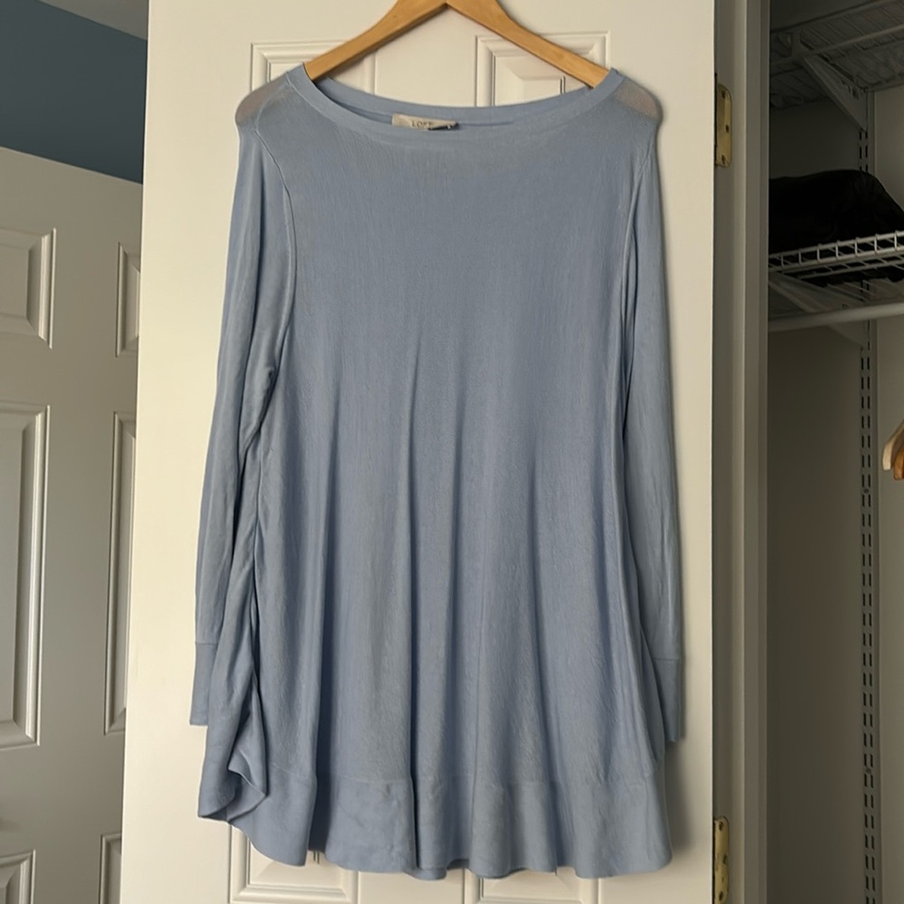 Light baby blue long sleeve top.Brand new, never worn.